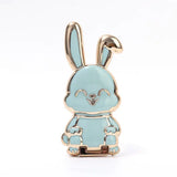 a blue enamel rabbit with a gold plated head