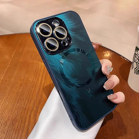 Blue-green iPhone case with feather design and MagSafe ring.