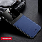 the back of a blue iphone case with a black leather case