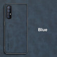 the blue iphone case is shown on a dark background