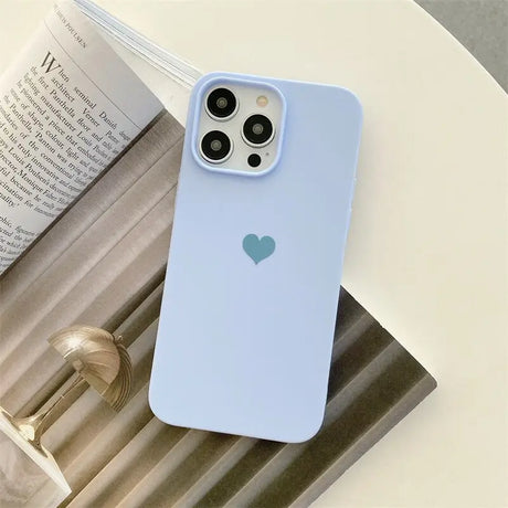 a blue iphone case with a heart on it