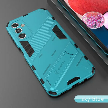 the back of a blue iphone case with a phone in the background