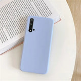 a blue iphone case sitting on a table