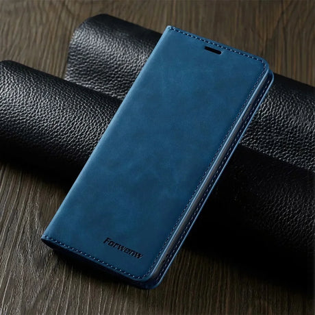 The back of a blue leather case on a wooden table