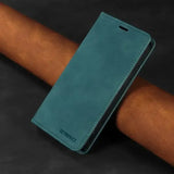the back of a blue leather iphone case