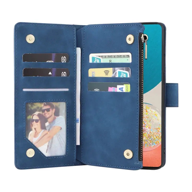 a blue leather wallet case with a photo and a card slot