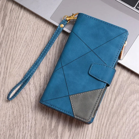 Blue leather wallet with geometric stitching and a wrist strap.