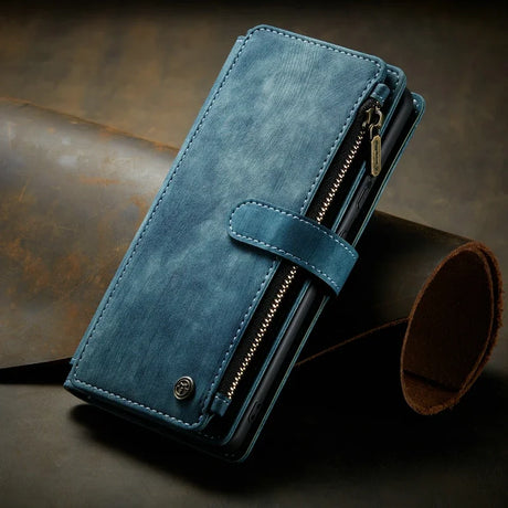 Blue leather wallet with a zipper compartment and snap closure.