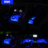 the interior of a car with blue lights