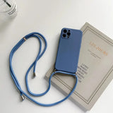 the blue leather phone case is next to a box