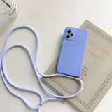 a blue phone case with a white strap