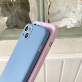 the back of a blue and pink iphone case