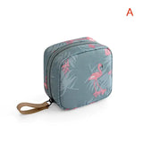 a blue and pink flaming print cosmetic bag