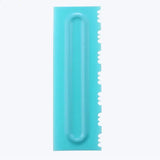 a blue plastic knife with a handle