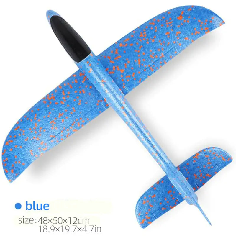 a blue and orange airplane with a black handle