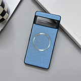 Blue smartphone case with a circular cutout, likely for wireless charging.