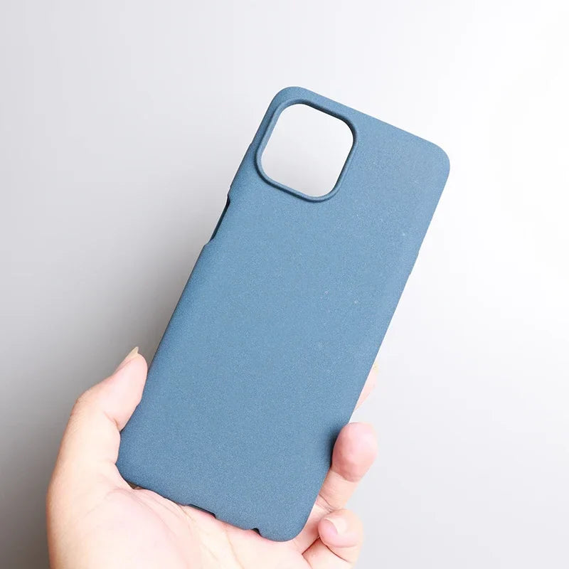 Blue smartphone case held in a hand.