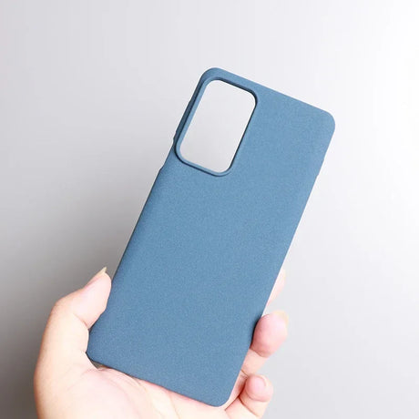 Blue smartphone case held in a hand.