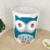 a blue owl toy box sitting on a counter