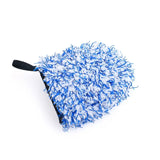 a blue and white pom with a black handle