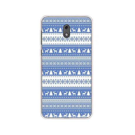 a blue and white christmas pattern with deers and trees on a white background