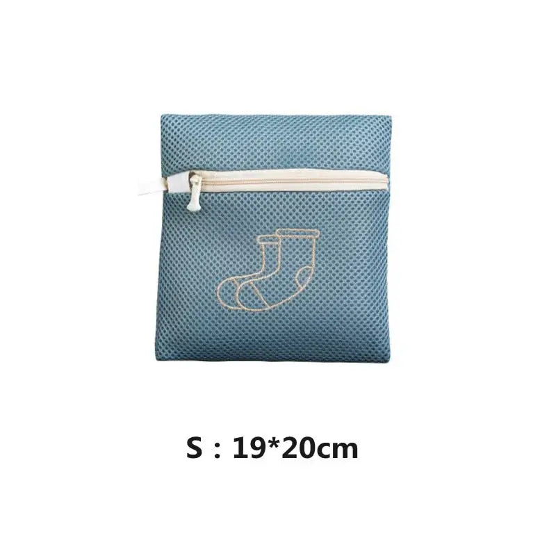 a close up of a blue bag with a zipper on it