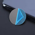 a blue and white triangle shaped glass magnet