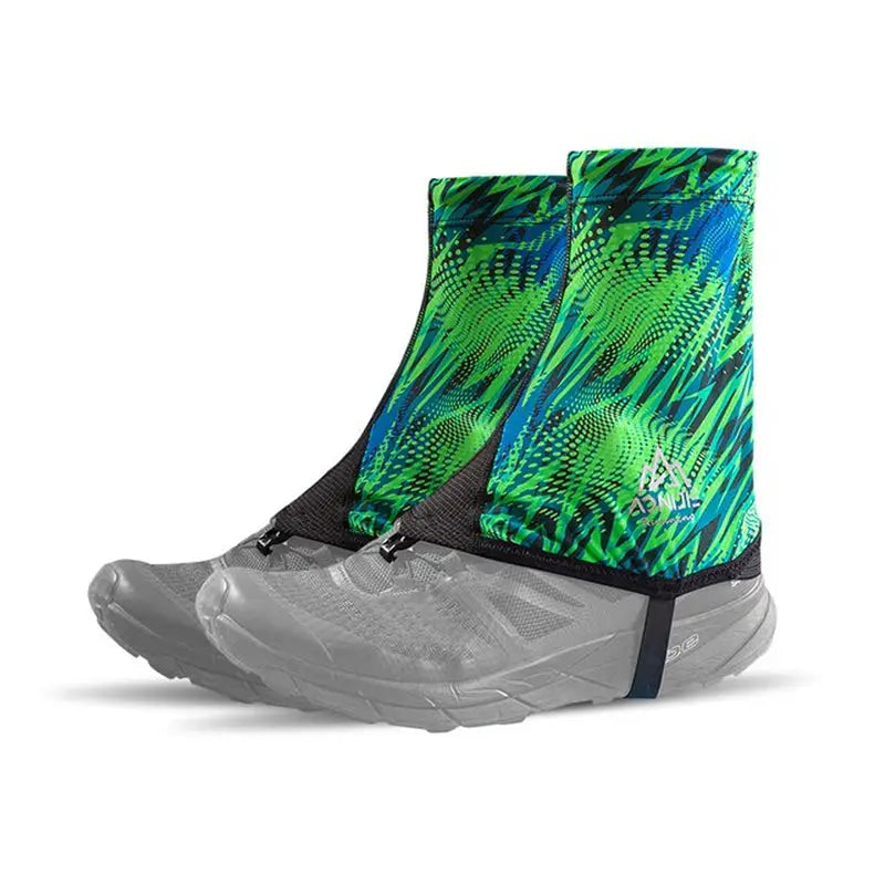 a close up of a pair of hiking gaiters with a green and blue pattern