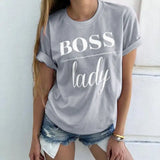 a woman wearing a grey boss lady t shirt