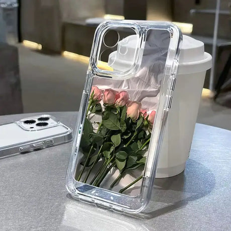 A bouquet of roses in a clear case