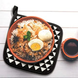 a bowl of food with eggs and rice