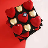 a box of chocolates with hearts on it