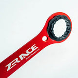 a red bike handle with a black handle