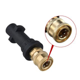 a brass connector with a red arrow on the side