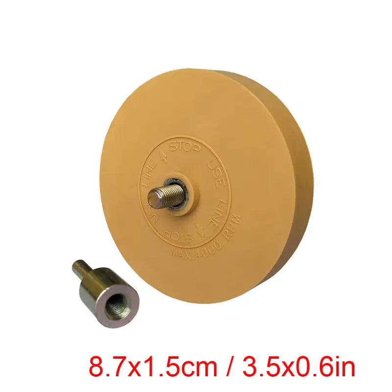 a brass plate with a screw and screw