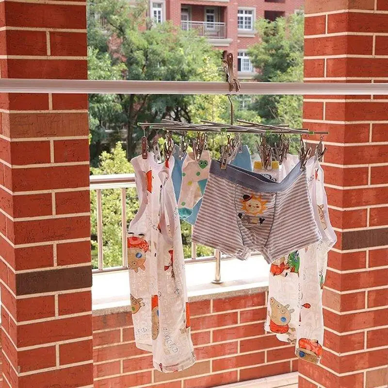 a brick wall with clothes hanging on it