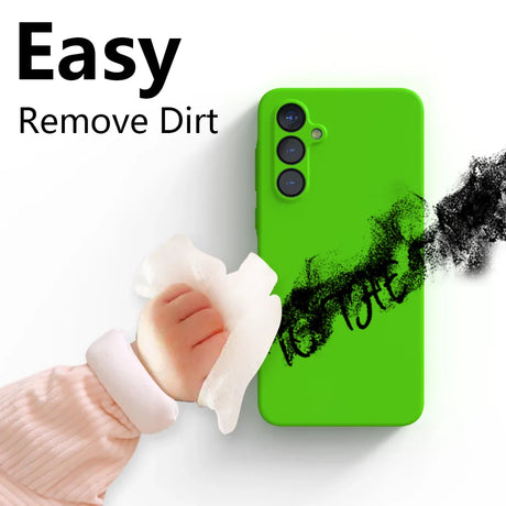 Bright green smartphone case with three camera lenses and black smudges being wiped off.