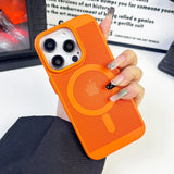 Bright orange smartphone case with a circular pattern and triple camera cutout.