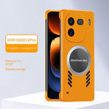 Bright orange smartphone case with a circular aluminum alloy element and multiple camera cutouts.