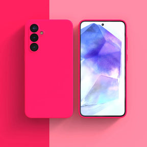 Bright pink smartphone with triple rear cameras and a colorful display screen.