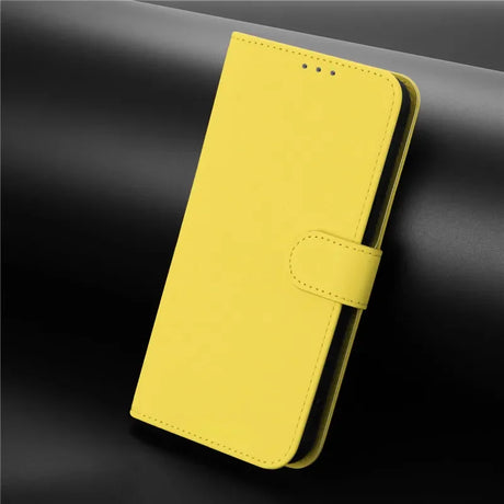 Bright yellow smartphone wallet case with a magnetic clasp.