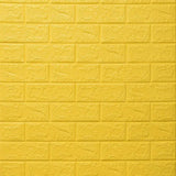 a yellow brick wall with a white brick