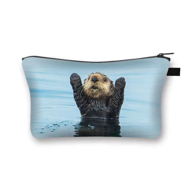 a sea otter in the water with its head above water