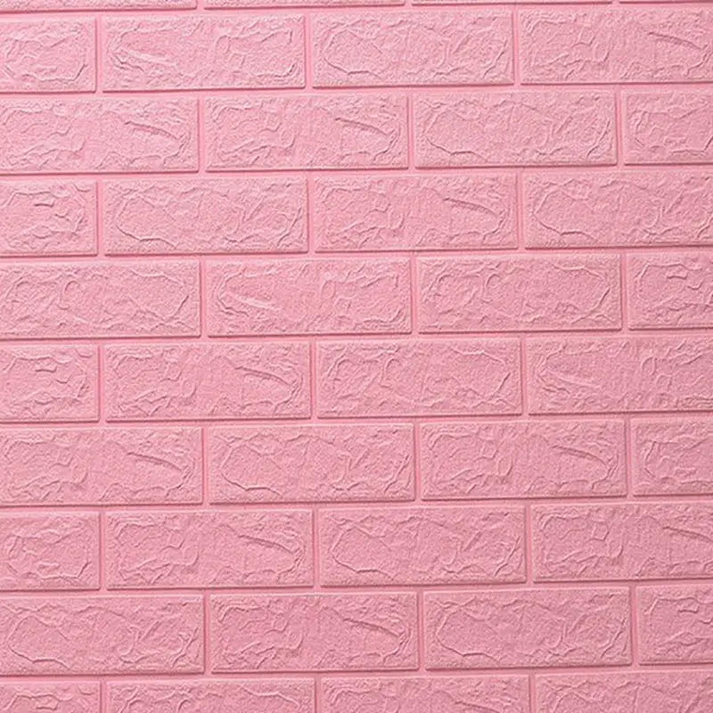 a pink brick wall with a white brick