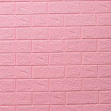 a pink brick wall with a white brick