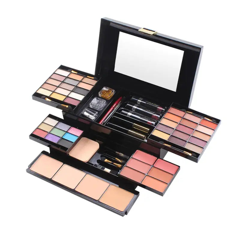 a close up of a makeup case with a mirror and various makeup products