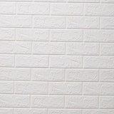 a close up of a white brick wall with a fire hydrant