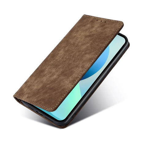 the back of a brown leather case with a leather cover