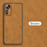 the back of a brown leather phone case