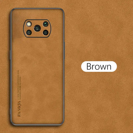 the back of a brown leather phone case